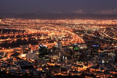 Aerial view of illuminated cityscape at night