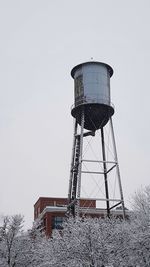 Low angle view of water tower against sky