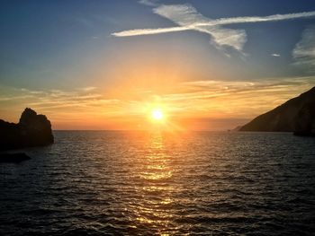 Scenic view of sea against sky during sunset