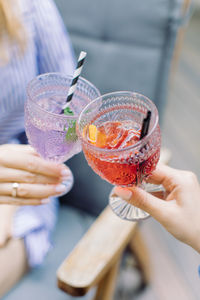 Close-up of woman hand holding drink