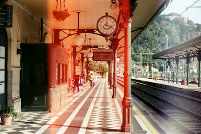 People walking on railroad track