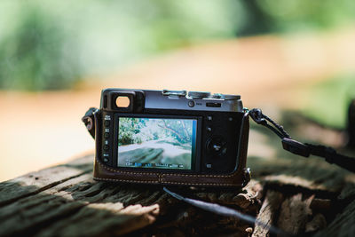 Close-up of camera on table