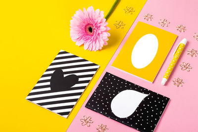 High angle view of pink flower on table