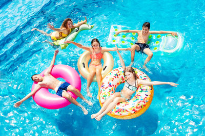 Group of people in swimming pool