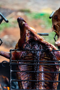 Close-up of meat on barbecue grill