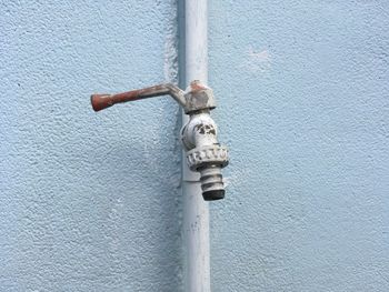 Close-up of pipe on wall