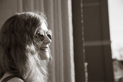 Portrait of young woman looking away