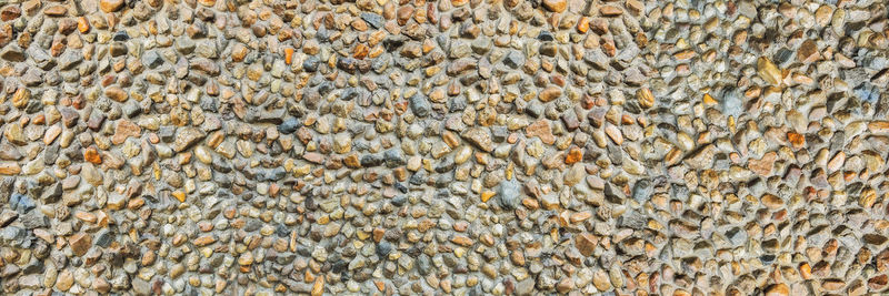 Full frame shot of pebbles in sea