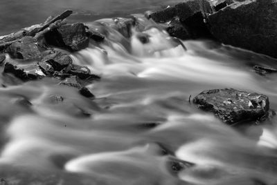 Close-up of rocks in water