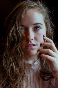 Close-up portrait of young woman