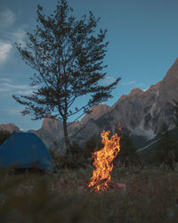 Camping and fire against the sky