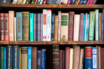 Books in shelves at library