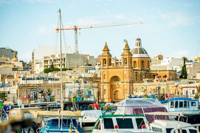 View of buildings against sky in city