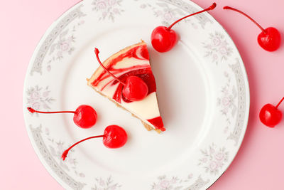 Directly above shot of strawberry cake on plate
