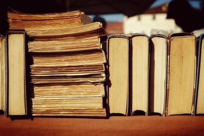 Close-up of books on display at stall in flea market