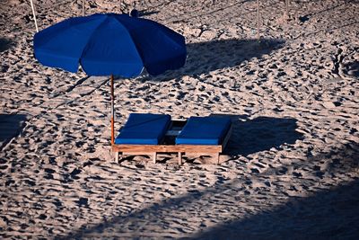 Empty chairs against the sky
