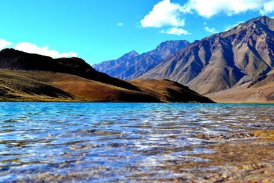 Scenic view of chandra taal lake against mountains at himachal pradesh