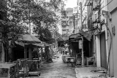 Empty alley with buildings in background