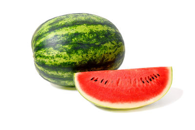 Close-up of fruits against white background