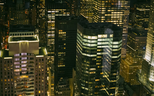 Aerial view of illuminated cityscape at night