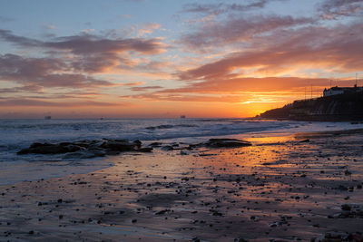 Scenic view of sea at sunset