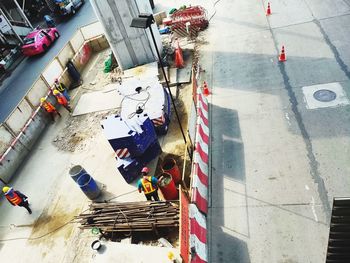 High angle view of people working on street in city