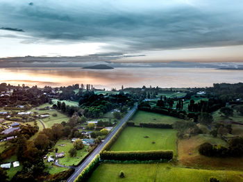 High angle view of city buildings during sunset