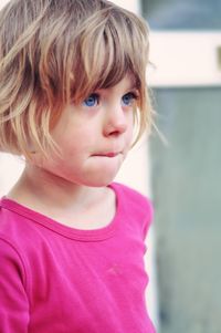 Portrait of cute girl looking away