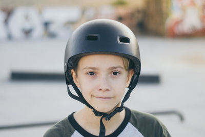 Portrait of boy wearing skateboard helmet