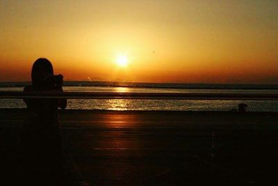 Scenic view of sea at sunset