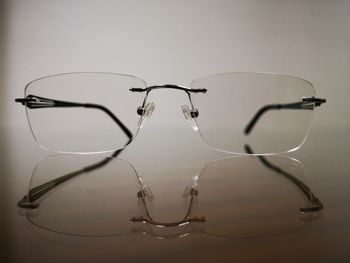 Close-up of eyeglasses on table