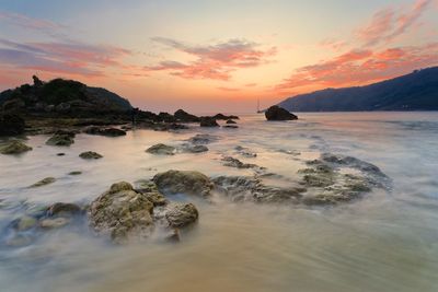 Scenic view of sea against sky during sunset