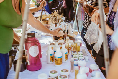 Group of people at market stall