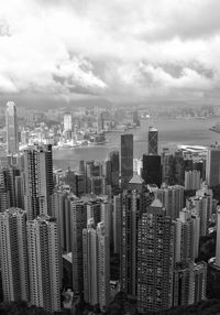 Aerial view of modern buildings in city against sky