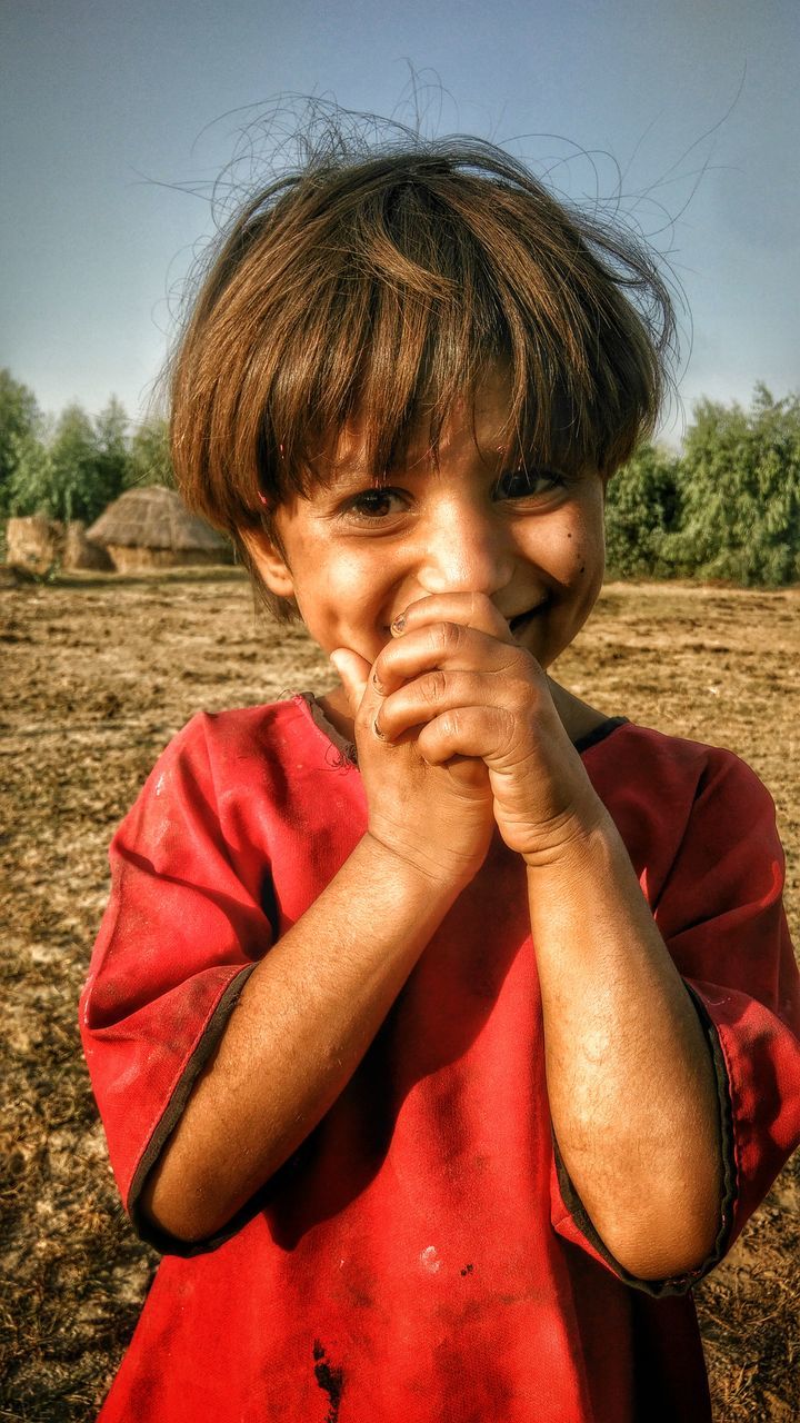 childhood, field, clear sky, person, front view, casual clothing, outdoors, day, red