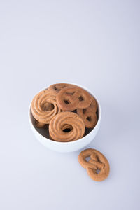 Close-up of cookies against white background