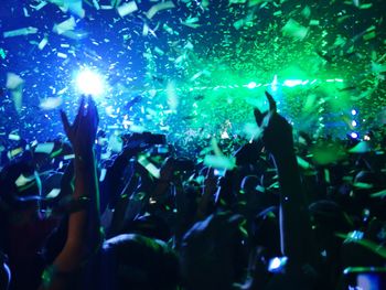 Crowd enjoying music concert