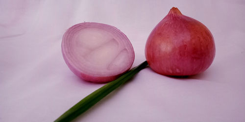 Close-up of fruits against white background