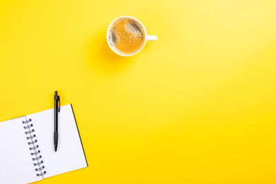 High angle view of coffee cup on table