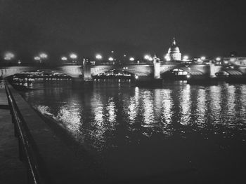 Reflection of illuminated buildings in water