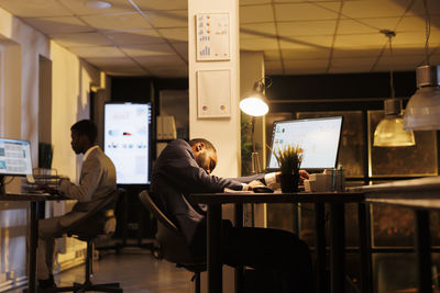 Man using laptop at office