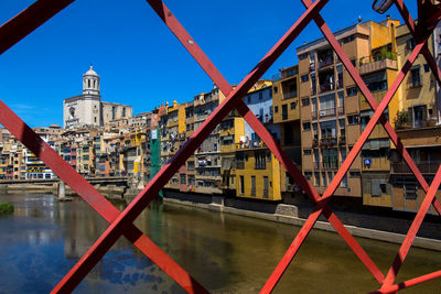 Close-up of buildings against clear blue sky