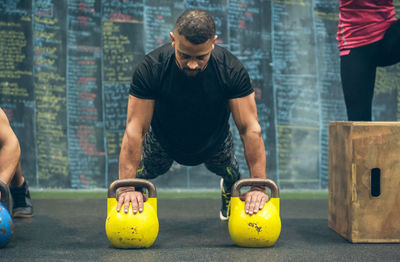 Group of people exercising in gym