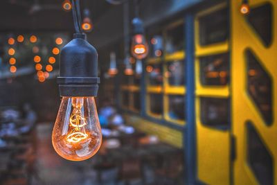 Close-up of illuminated light bulb