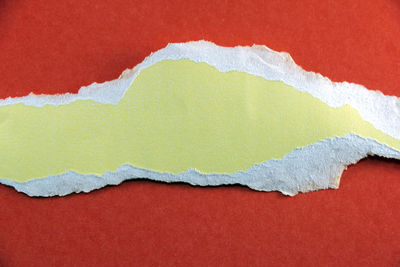 Close-up of yellow paint on paper