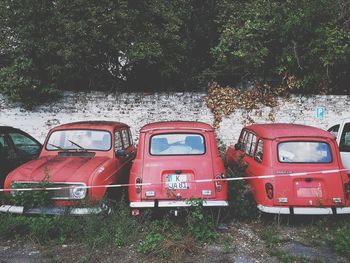 Red vintage car in forest