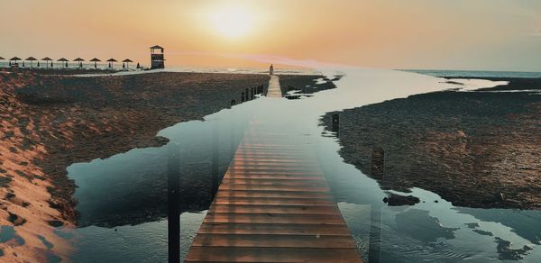 Scenic view of sea against sky during sunset