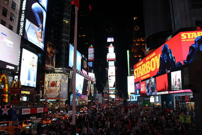 Crowd in city at night