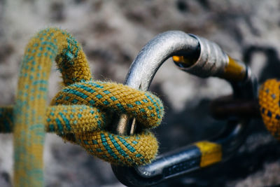 Close-up of rope tied on metal