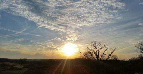 Scenic view of silhouette landscape against sky during sunset